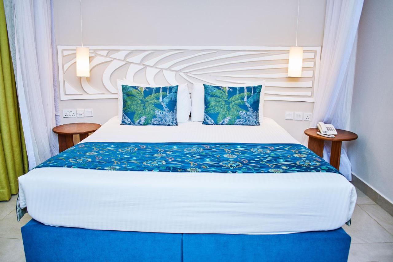 Neptune Village Beach Resort & Spa Galu Exterior photo