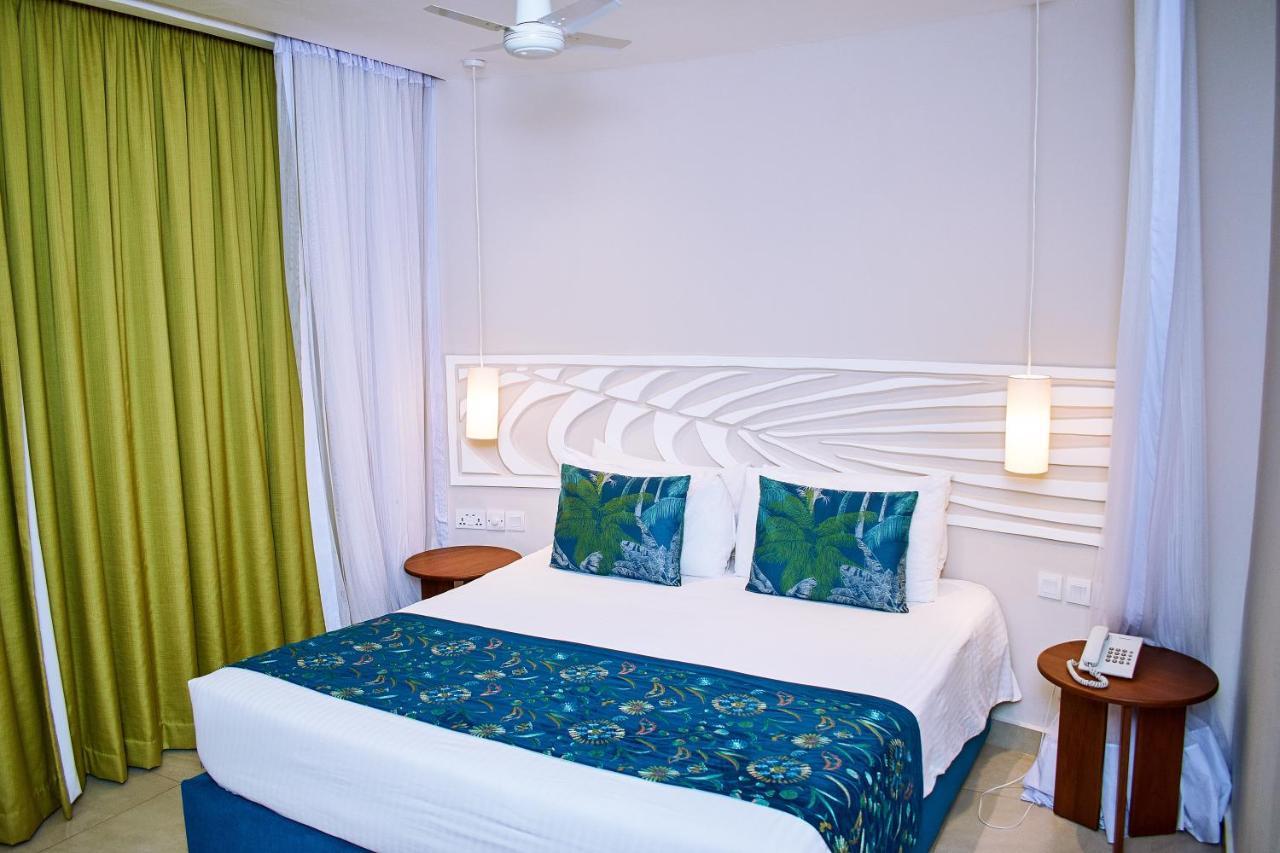 Neptune Village Beach Resort & Spa Galu Exterior photo
