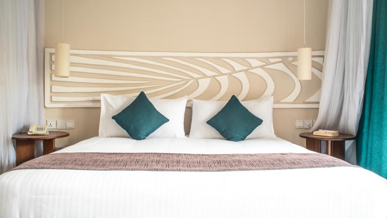 Neptune Village Beach Resort & Spa Galu Exterior photo